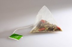 尼龙三角包、中草药混合包装机的图片