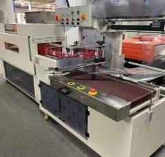 不锈钢保鲜盒热收缩包装机的图片